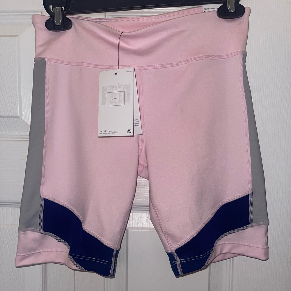 Nike One dri-fit shorts NWT pale pink with navy and gray accents.